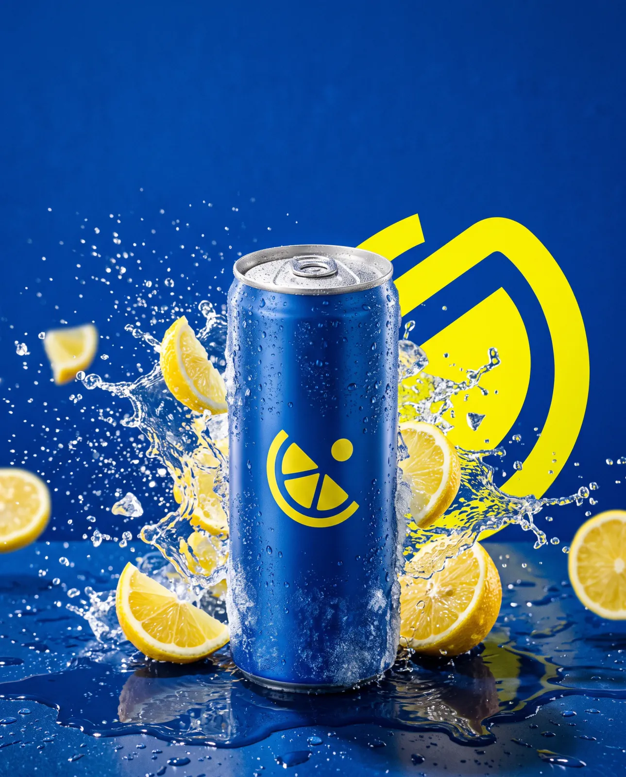 A chilled blue citrus drink can surrounded by lemon wedges and splashing water against a vivid blue-and-yellow graphic background.