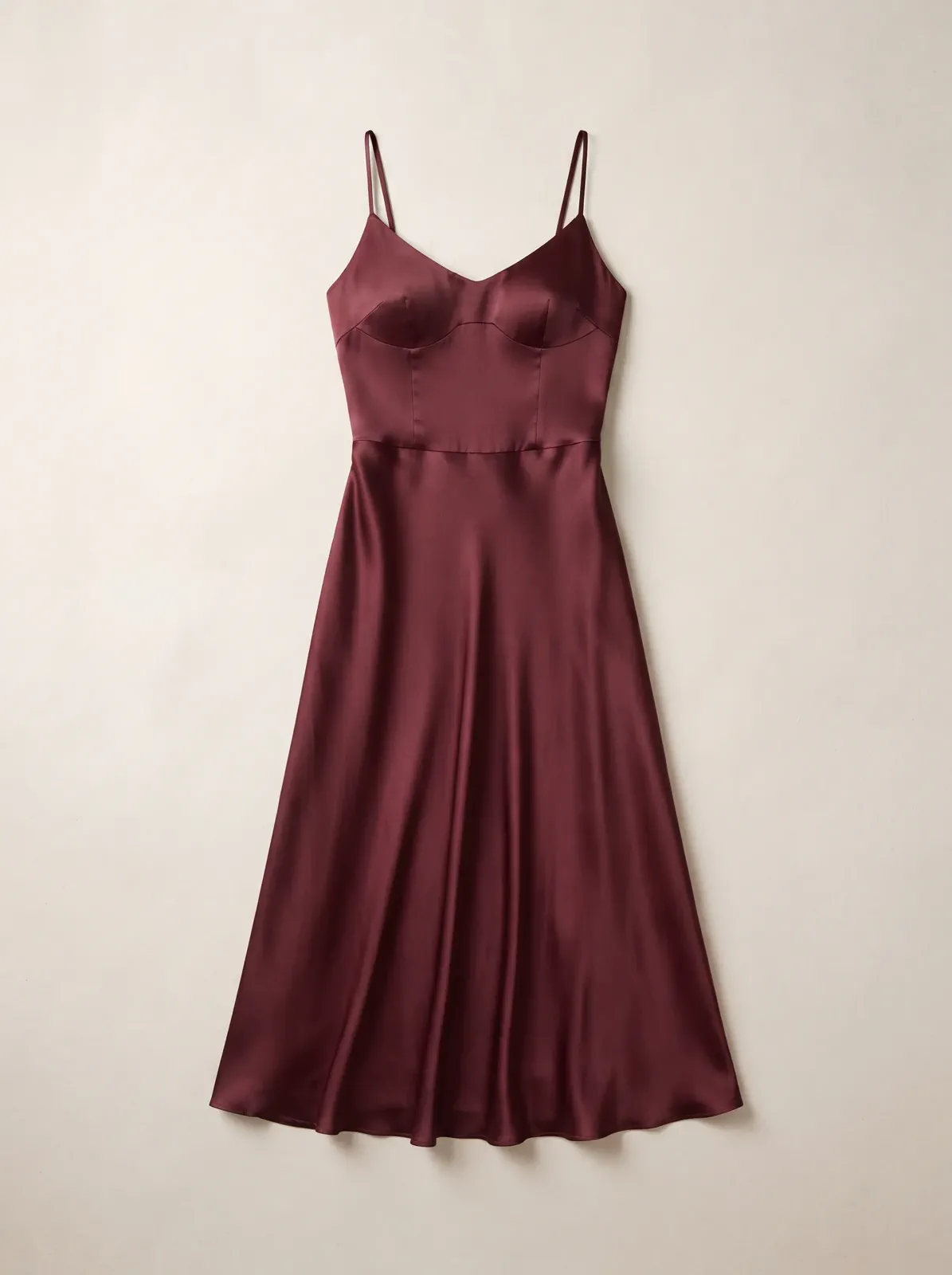 A women’s satin midi dress photographed clearly on a model.
